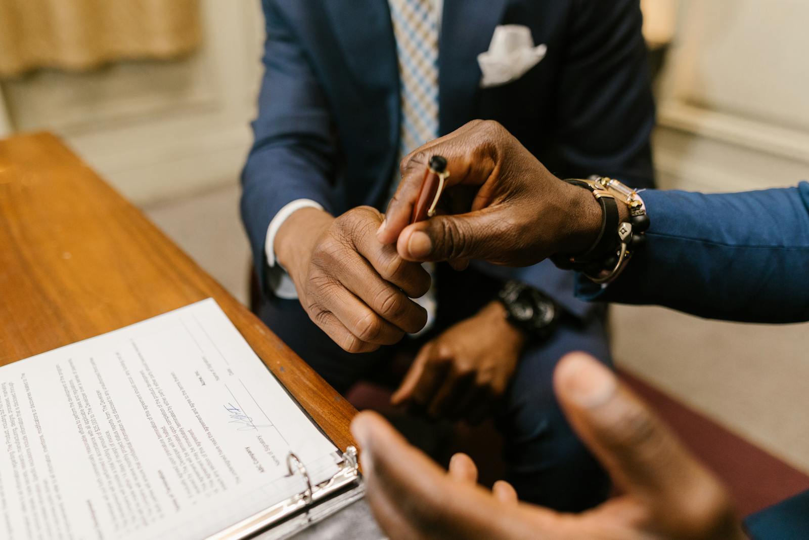 A personal representative reviewing estate documents at a desk
