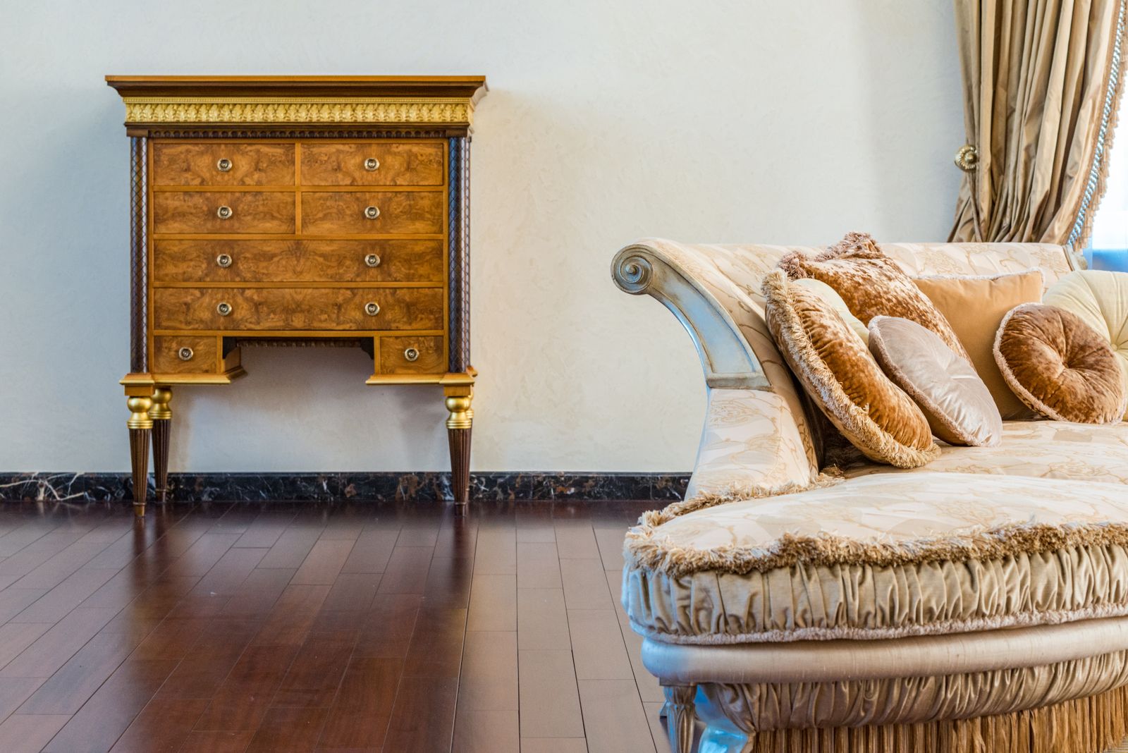 A study or library with antique furniture, leather-bound books, and personal effects — the kind of personal property that sits inside a probate estate alongside the real estate itself
